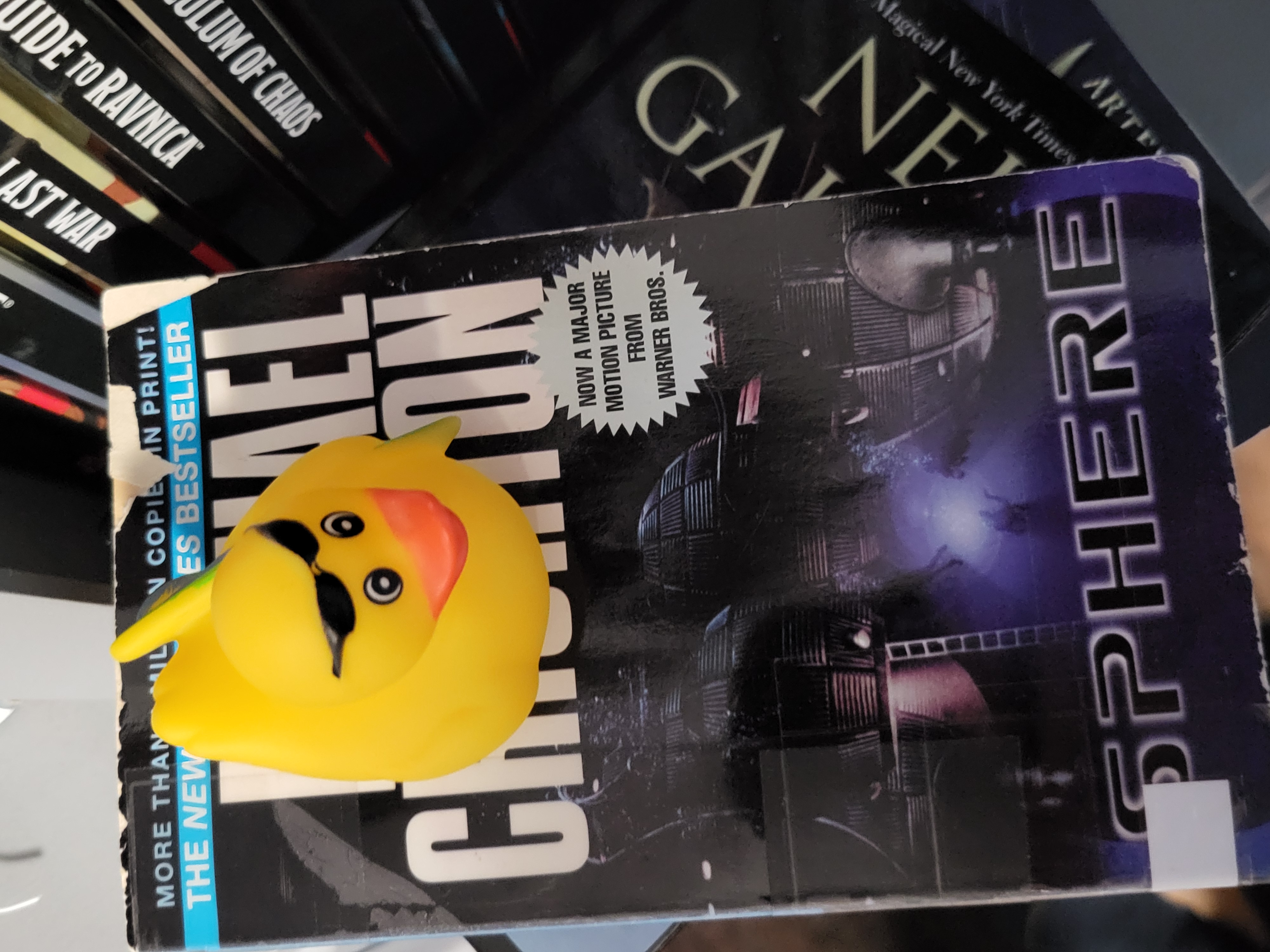 Gerald sitting atop some classic literature
