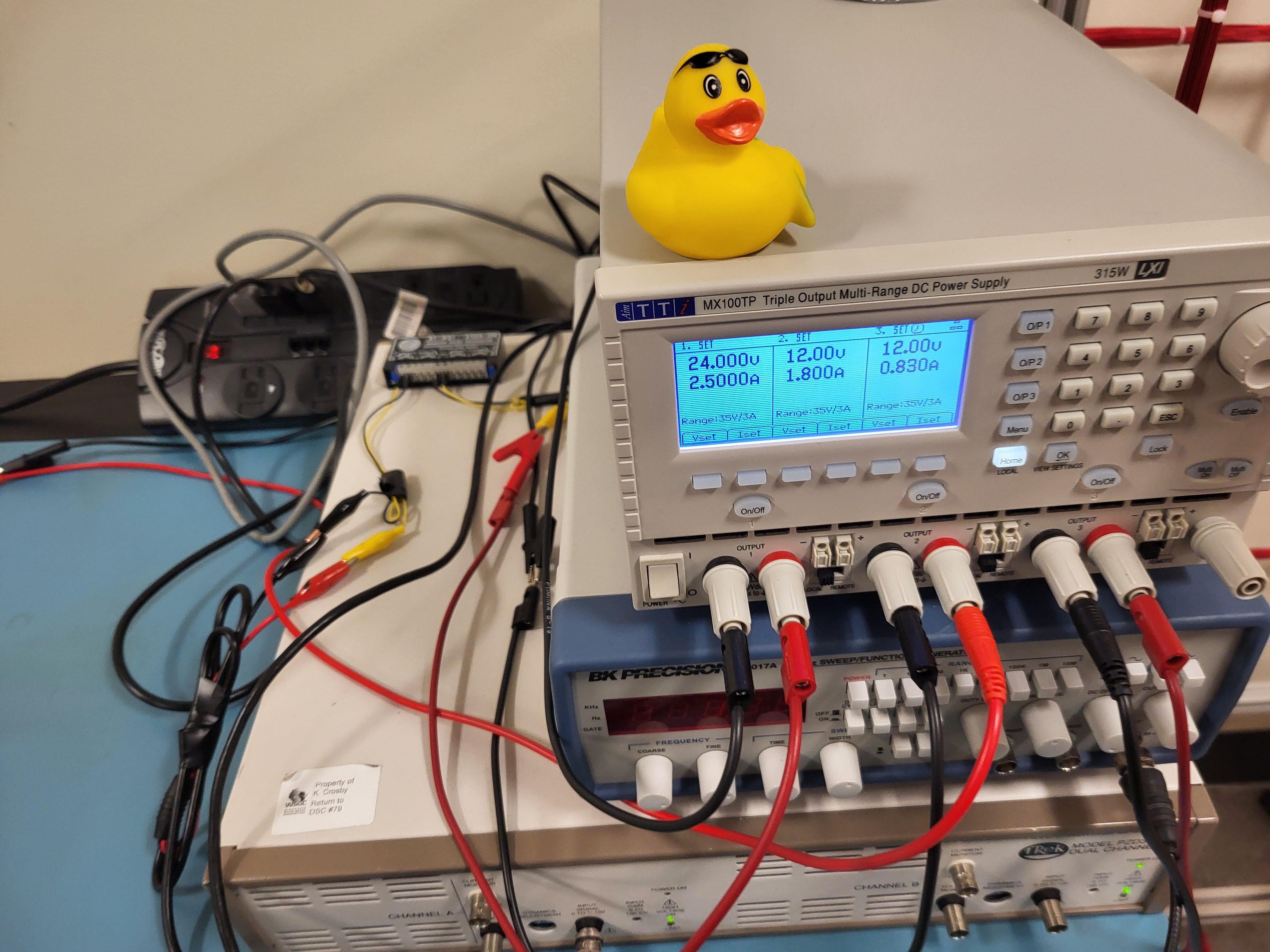 Gerald sitting on hodgepodged power supply and high voltage amplifier